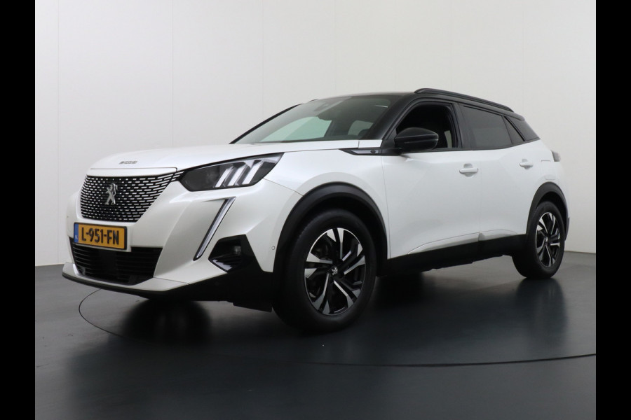 Peugeot e-2008 EV50kWh Panorama-Schuif/kanteldak Allure 3D-Virtual Cockpit Apple Carplay/Android Auto Navi Ecc Cruise Control Pdc 1/2 Leer Draadloos GSM laden Led Regen-Lichtsensor DAB Verkeersbord detectie Zeer compleet! 45.000 nieuw!