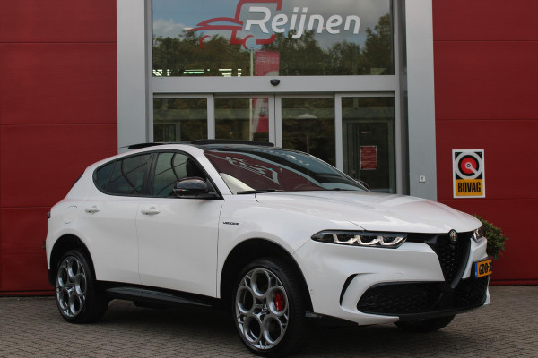 Alfa Romeo Tonale PHEV 280PK VELOCE | PANORAMISCH SCHUIF/KANTEL DAK | PREMIUM PACK: LEDEREN BEKLEDING/GEVENTILEERDE VOORSTOELEN/4-VOUDIG ELEKTRISCH VERSTELBARE LENDESTEUN VOORSTOELEN/HOOGGLANS ZWARTE RAAMOMLIJSTING/AMBIENT LIGHTING | TECHNOLOGY PACK: PARKEERWAARSCHUWING VOOR EN ACHTER/360° CAMERA/AUTOMATISCH INPARKEREN/ AUTONOMOUS DRIVING LEVEL 2: ADAPTIVE CRUISE CONTROL/LANE CENTERING ASSIST/TRAFFIC JAM ASSIST DODEHOEK DETECTIE AUTOMATISCH DIMMENDE BUITENSPIEGELS ELEKTRISCH BEDIENBARE ACHTERKLEP | WINTERPACK: STOELVERWARMING VOOR/STUURVERWARMING/VERWARMBARE RUITENSPROEIERS | HARMAN KAR