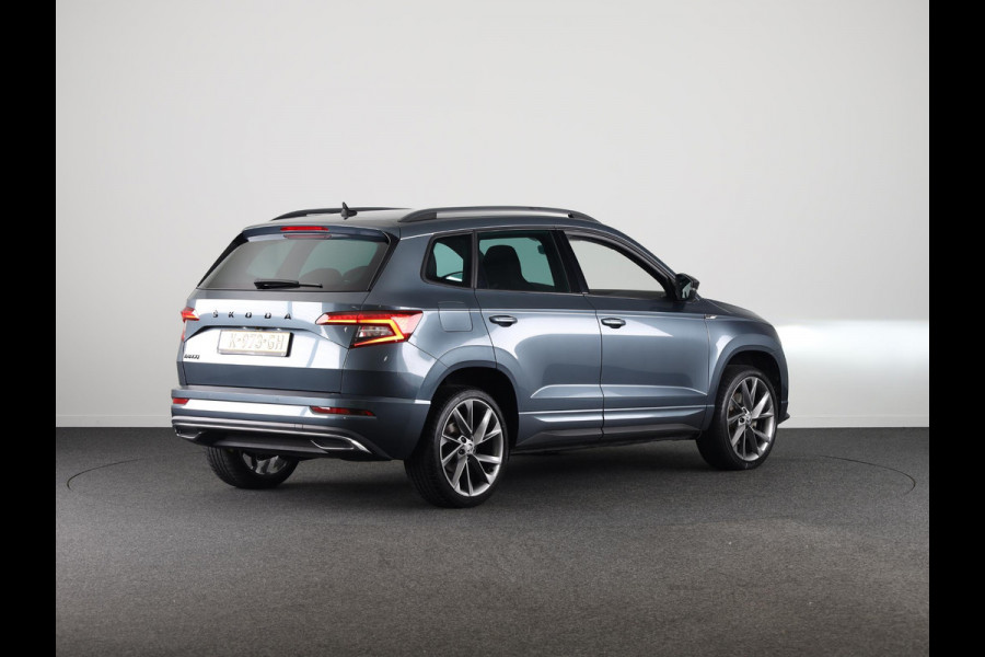 Škoda Karoq 1.5 TSI ACT Sportline Business 150 pk Automaat (DSG) | Navigatie | Elektr. trekhaak | Parkeersensoren | Achteruitrijcamera | Adaptieve cruise control | Stoelverwarming |