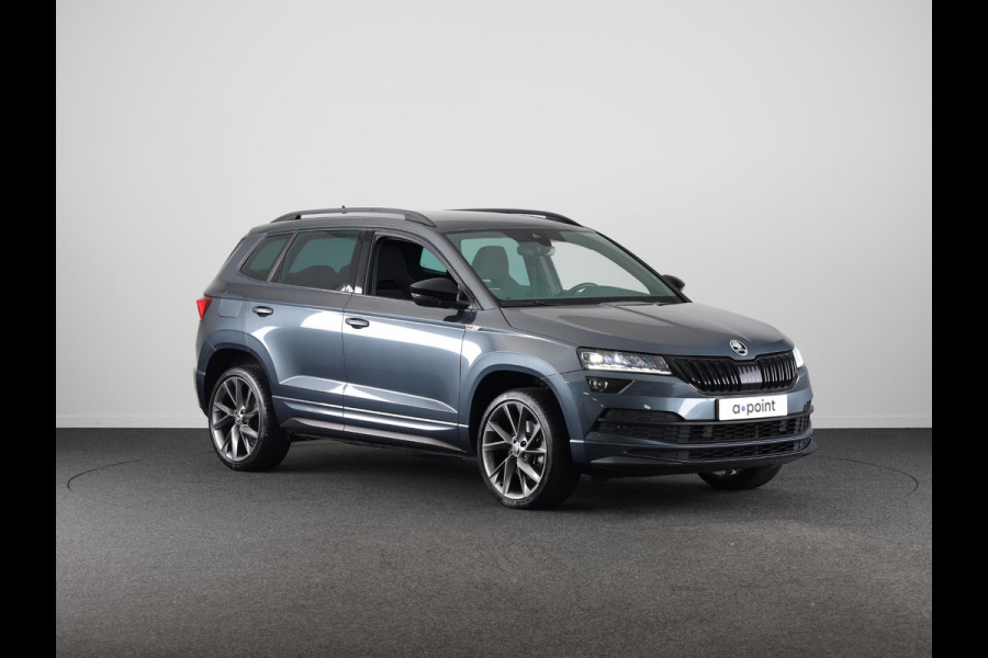 Škoda Karoq 1.5 TSI ACT Sportline Business 150 pk Automaat (DSG) | Navigatie | Elektr. trekhaak | Parkeersensoren | Achteruitrijcamera | Adaptieve cruise control | Stoelverwarming |