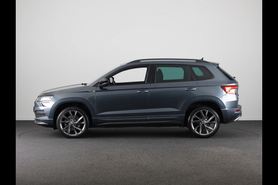 Škoda Karoq 1.5 TSI ACT Sportline Business 150 pk Automaat (DSG) | Navigatie | Elektr. trekhaak | Parkeersensoren | Achteruitrijcamera | Adaptieve cruise control | Stoelverwarming |