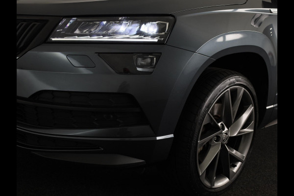 Škoda Karoq 1.5 TSI ACT Sportline Business 150 pk Automaat (DSG) | Navigatie | Elektr. trekhaak | Parkeersensoren | Achteruitrijcamera | Adaptieve cruise control | Stoelverwarming |
