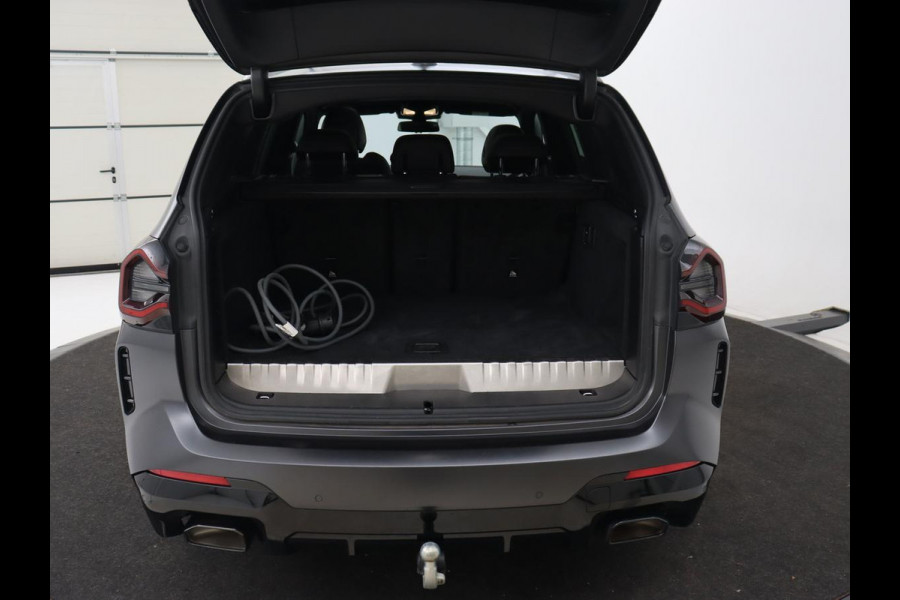 BMW X3 xDrive30e M Sport | Panoramadak | Leder | Head-Up | LaserLight | Trekhaak | Stoelverwarming | Camera | Carplay | Live Cockpit | Sportstoelen | Navigatie | Individual Lak | PHEV | Plug In