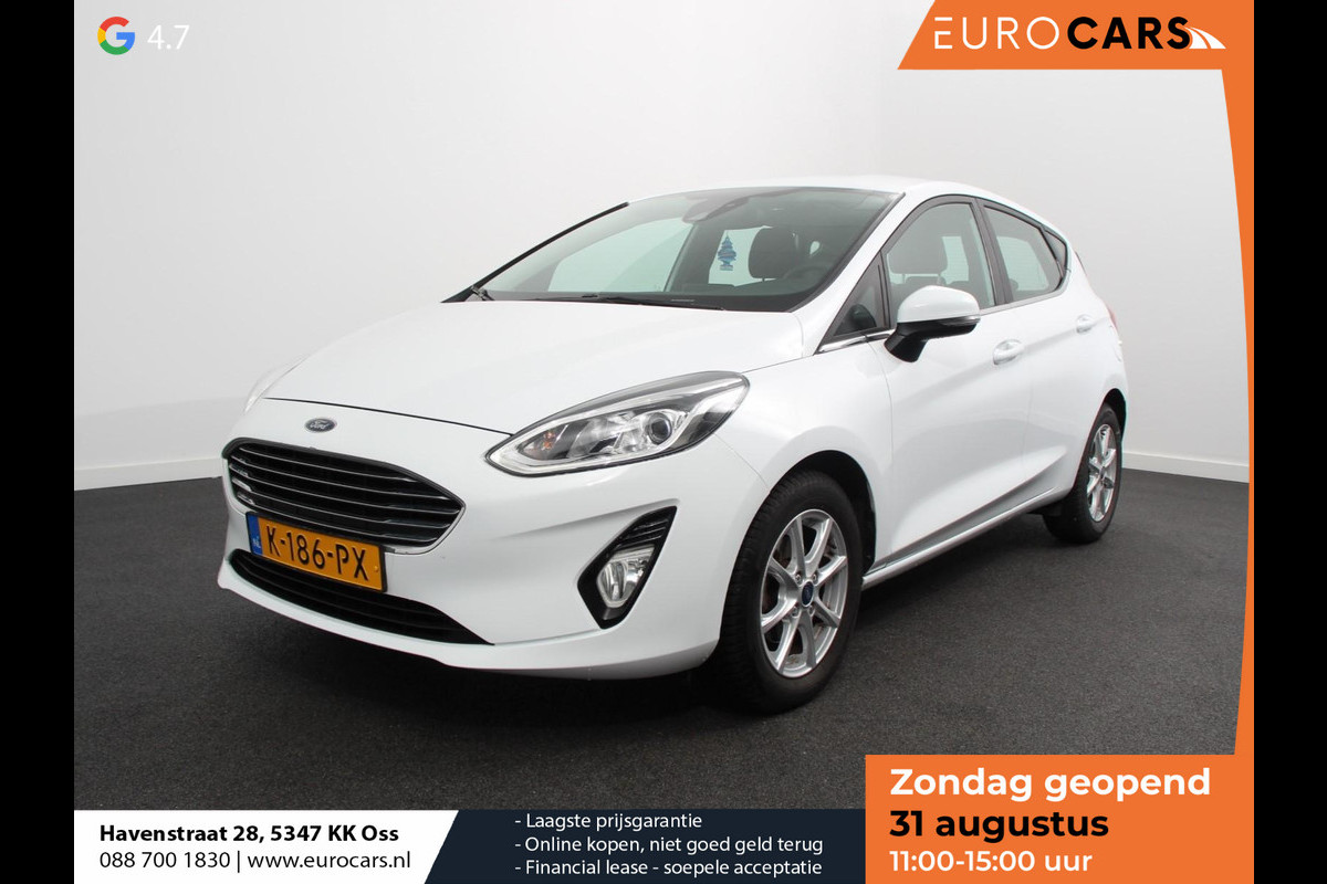 Ford Fiesta 1.0 EcoBoost Titanium | Navigatie | Apple Carplay/Android Auto | Climate Control | Stoelverwarming | Cruise Control | Lichtmetalen Velgen Ford Fiesta 1.0 EcoBoost Titanium | Navigatie | Apple Carplay/Android Auto | Climate Control | Stoelverwarming | Cruise Control | Lichtmetalen Velgen