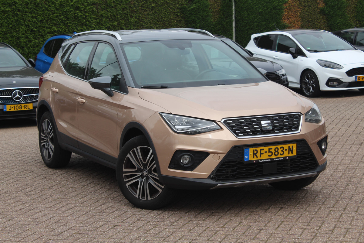 Seat Arona 1.0 TSI Xcellence Launch Edition / Camera / Navigatie / Keyless / Cruise Control / LED Koplampen / 17'' / DAB / Stoelverwarming / Dodehoek Seat Arona 1.0 TSI Xcellence Launch Edition / Camera / Navigatie / Keyless / Cruise Control / LED Koplampen / 17'' / DAB / Stoelverwarming / Dodehoek