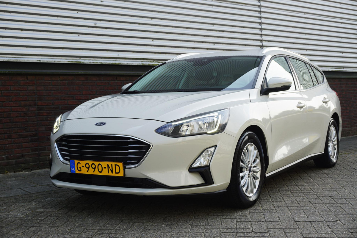 Ford FOCUS Wagon 1.0 EcoBoost Titanium Business/Dealeronderhouden/ 1e Eigenaar/Rijklaarprijs. Ford FOCUS Wagon 1.0 EcoBoost Titanium Business/Dealeronderhouden/ 1e Eigenaar/Rijklaarprijs.