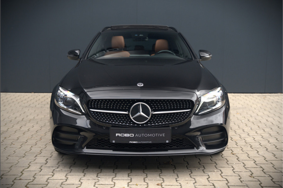 Mercedes-Benz C-Klasse Estate 300 e Business Solution AMG | Panoramadak | Stoelverwarming | Multibeam LED | Camera | Navigatie | Parkeersensoren | Leer | Apple Carplay | Ambiance Verlichting