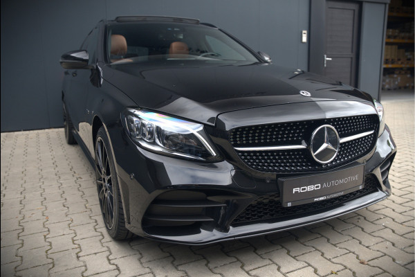 Mercedes-Benz C-Klasse Estate 300 e Business Solution AMG | Panoramadak | Stoelverwarming | Multibeam LED | Camera | Navigatie | Parkeersensoren | Leer | Apple Carplay | Ambiance Verlichting
