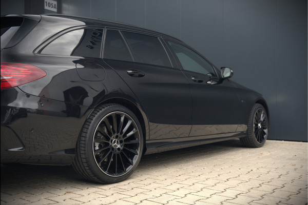 Mercedes-Benz C-Klasse Estate 300 e Business Solution AMG | Panoramadak | Stoelverwarming | Multibeam LED | Camera | Navigatie | Parkeersensoren | Leer | Apple Carplay | Ambiance Verlichting