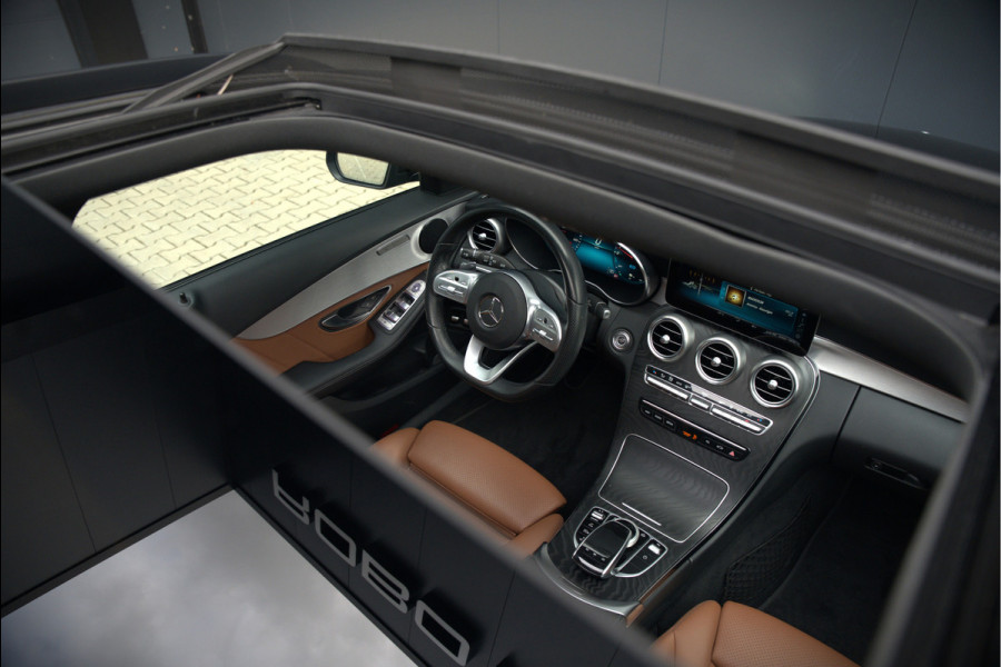 Mercedes-Benz C-Klasse Estate 300 e Business Solution AMG | Panoramadak | Stoelverwarming | Multibeam LED | Camera | Navigatie | Parkeersensoren | Leer | Apple Carplay | Ambiance Verlichting