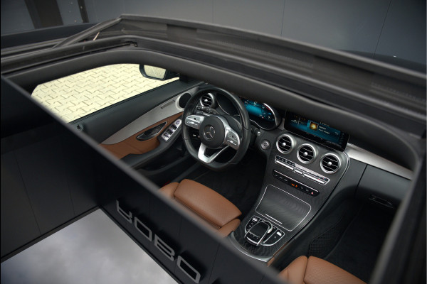 Mercedes-Benz C-Klasse Estate 300 e Business Solution AMG | Panoramadak | Stoelverwarming | Multibeam LED | Camera | Navigatie | Parkeersensoren | Leer | Apple Carplay | Ambiance Verlichting