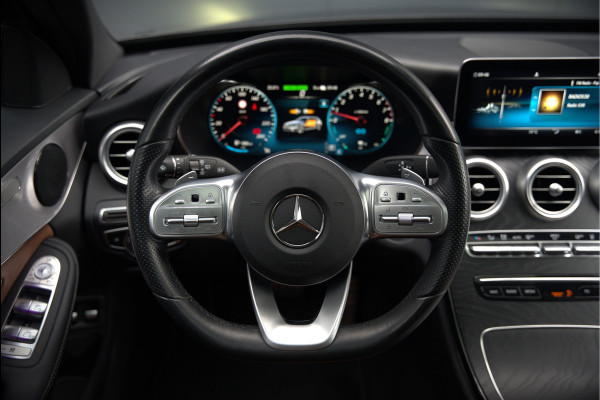 Mercedes-Benz C-Klasse Estate 300 e Business Solution AMG | Panoramadak | Stoelverwarming | Multibeam LED | Camera | Navigatie | Parkeersensoren | Leer | Apple Carplay | Ambiance Verlichting