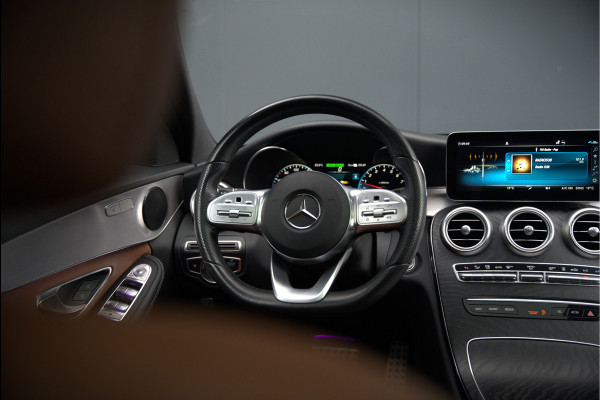 Mercedes-Benz C-Klasse Estate 300 e Business Solution AMG | Panoramadak | Stoelverwarming | Multibeam LED | Camera | Navigatie | Parkeersensoren | Leer | Apple Carplay | Ambiance Verlichting