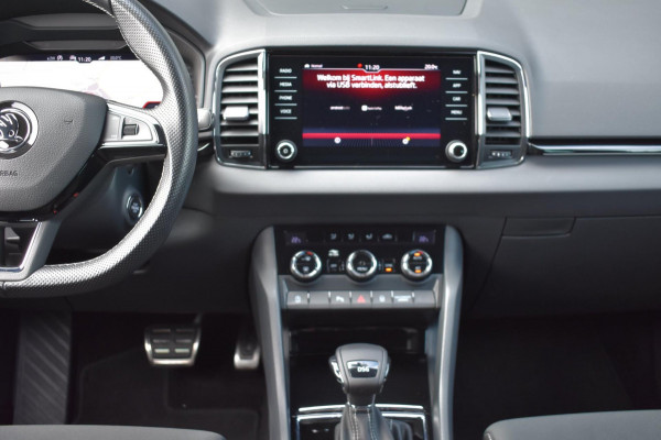 Škoda Karoq 1.5 TSI ACT Sportline | TREKHAAK | CAMERA | NAP | VIRTUAL COCKPIT | APPLE CARPLAY | ANDROID AUTO | DEALER ONDERHOUDEN