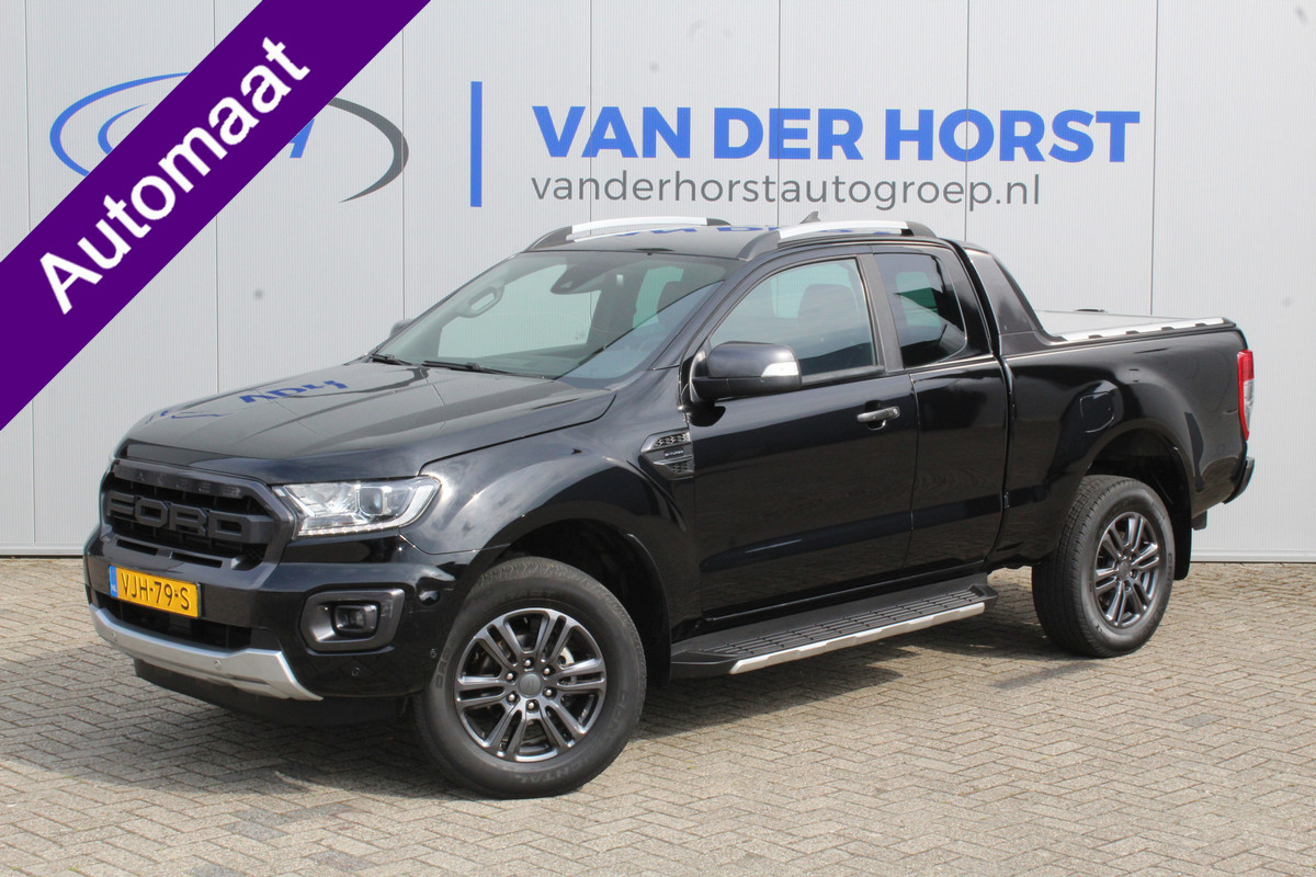 Ford Ranger 2.0-213pk Bi-turbo 'Wildtrak' Supercab. AUTOMAAT / VIER wielaandrijving. Stoere vierwielaangedreven krachtpatser ! Trekgewicht 3.500kg ! Stoel- en voorraamverwarming, Autm. airco dual, Adaptieve cruise control, Navigatie, Telefoonvoorb., Trekhaak etc. Ford Ranger 2.0-213pk Bi-turbo 'Wildtrak' Supercab. AUTOMAAT / VIER wielaandrijving. Stoere vierwielaangedreven krachtpatser ! Trekgewicht 3.500kg ! Stoel- en voorraamverwarming, Autm. airco dual, Adaptieve cruise control, Navigatie, Telefoonvoorb., Trekhaak etc.