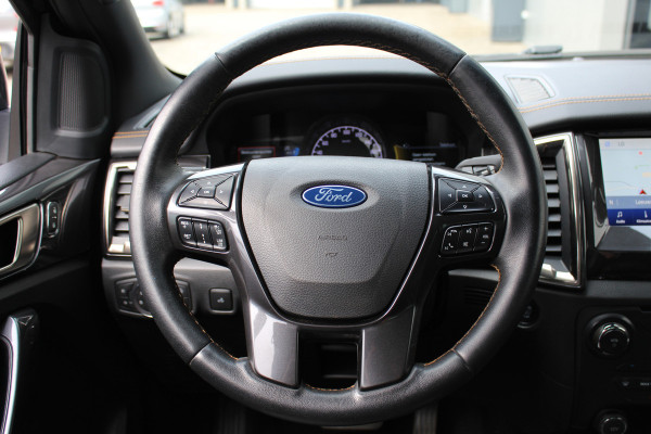 Ford Ranger 2.0-213pk Bi-turbo 'Wildtrak' Supercab. AUTOMAAT / VIER wielaandrijving. Stoere vierwielaangedreven krachtpatser ! Trekgewicht 3.500kg ! Stoel- en voorraamverwarming, Autm. airco dual, Adaptieve cruise control, Navigatie, Telefoonvoorb., Trekhaak etc.