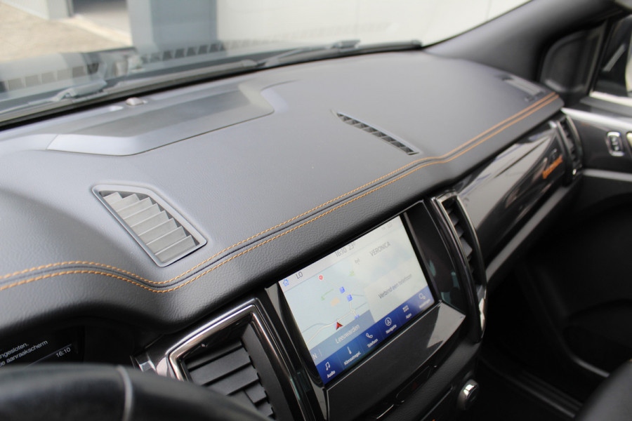 Ford Ranger 2.0-213pk Bi-turbo 'Wildtrak' Supercab. AUTOMAAT / VIER wielaandrijving. Stoere vierwielaangedreven krachtpatser ! Trekgewicht 3.500kg ! Stoel- en voorraamverwarming, Autm. airco dual, Adaptieve cruise control, Navigatie, Telefoonvoorb., Trekhaak etc.