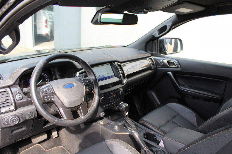 Ford Ranger 2.0-213pk Bi-turbo 'Wildtrak' Supercab. AUTOMAAT / VIER wielaandrijving. Stoere vierwielaangedreven krachtpatser ! Trekgewicht 3.500kg ! Stoel- en voorraamverwarming, Autm. airco dual, Adaptieve cruise control, Navigatie, Telefoonvoorb., Trekhaak etc.