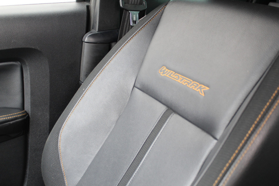 Ford Ranger 2.0-213pk Bi-turbo 'Wildtrak' Supercab. AUTOMAAT / VIER wielaandrijving. Stoere vierwielaangedreven krachtpatser ! Trekgewicht 3.500kg ! Stoel- en voorraamverwarming, Autm. airco dual, Adaptieve cruise control, Navigatie, Telefoonvoorb., Trekhaak etc.