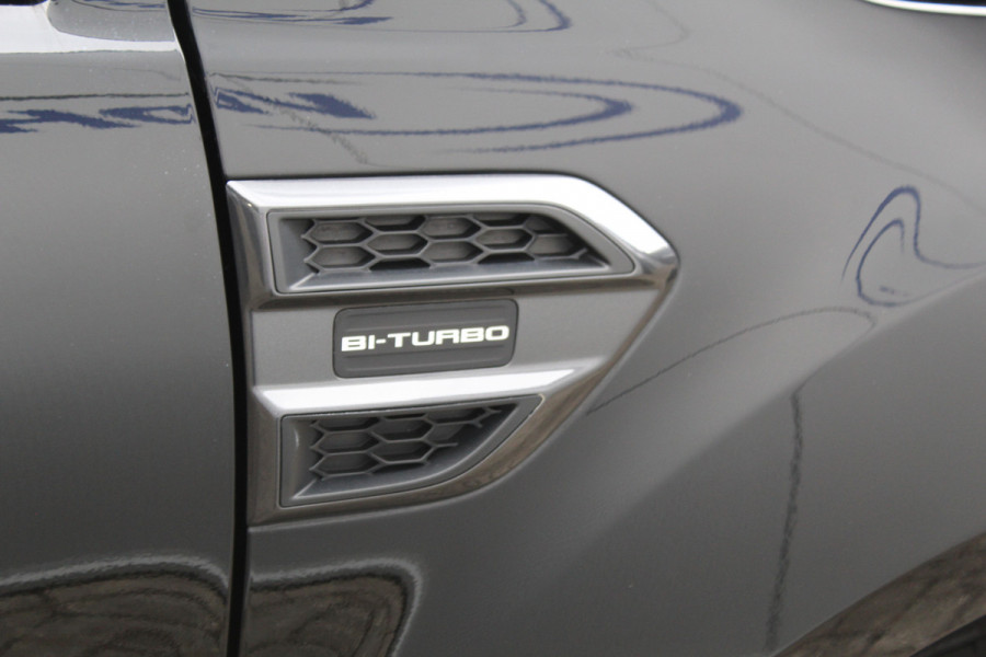 Ford Ranger 2.0-213pk Bi-turbo 'Wildtrak' Supercab. AUTOMAAT / VIER wielaandrijving. Stoere vierwielaangedreven krachtpatser ! Trekgewicht 3.500kg ! Stoel- en voorraamverwarming, Autm. airco dual, Adaptieve cruise control, Navigatie, Telefoonvoorb., Trekhaak etc.
