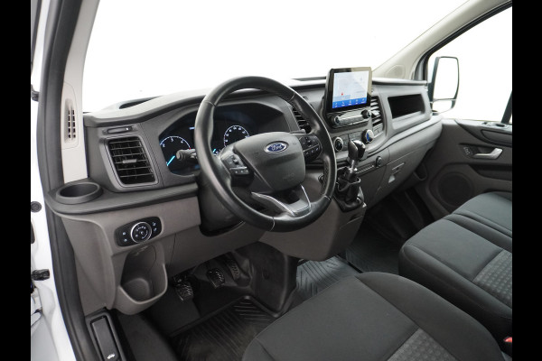 Ford Transit Custom 280 2.0TDCI 130PK L1H1 3-Persoons Apple Carplay Android Auto Airco Trekhaak Camera Cruise Control Pdc Voorruitverwarming Trend Regen-Lichtsensor Betonplex Vloer Wandbetimmering Schuifdeur Euro 6 385NM Koppel Zeer Compleet!