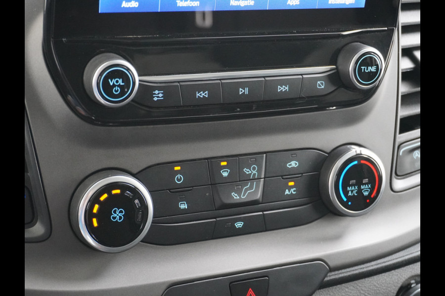 Ford Transit Custom 280 2.0TDCI 130PK L1H1 3-Persoons Apple Carplay Android Auto Airco Trekhaak Camera Cruise Control Pdc Voorruitverwarming Trend Regen-Lichtsensor Betonplex Vloer Wandbetimmering Schuifdeur Euro 6 385NM Koppel Zeer Compleet!
