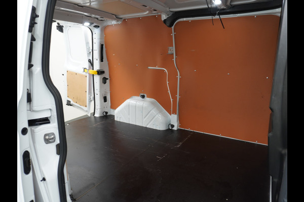Ford Transit Custom 280 2.0TDCI 130PK L1H1 3-Persoons Apple Carplay Android Auto Airco Trekhaak Camera Cruise Control Pdc Voorruitverwarming Trend Regen-Lichtsensor Betonplex Vloer Wandbetimmering Schuifdeur Euro 6 385NM Koppel Zeer Compleet!