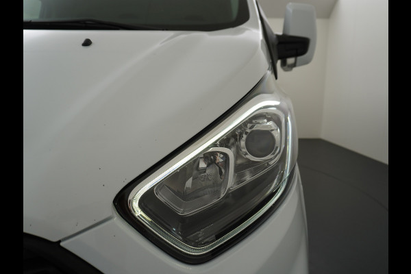 Ford Transit Custom 280 2.0TDCI 130PK L1H1 3-Persoons Apple Carplay Android Auto Airco Trekhaak Camera Cruise Control Pdc Voorruitverwarming Trend Regen-Lichtsensor Betonplex Vloer Wandbetimmering Schuifdeur Euro 6 385NM Koppel Zeer Compleet!