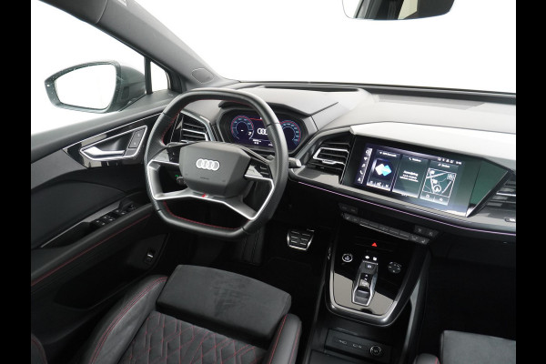 Audi Q4 e-tron 50 quattro S edition 77 kWh VAN: 44.900,- VOOR: 40.877,- UW HERFSTVOORDEEL: 4.023,- ELEKTRISCH PANORAMADAK | HEAD-UP DISPLAY | ADAPTIEVE CRUISE CONTROL | CAMERA | ELEKTRISCHE TREKHAAK | RIJKLAAR MET 12 MAANDEN BOVAG GARANTIE!