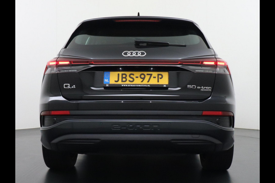Audi Q4 e-tron 50 quattro Launch edition Advanced 77 kWh VAN: 42.900,- VOOR: 38.877,- UW HERFSTVOORDEEL: 4.023,-  ADAPTIEVE CRUISE CONTROL | LEDEREN BEKLEDING | STOELVERWARMING | ELEKTRISCHE ACHTERKLEP | CAMERA | RIJKLAAR MET 12 MAANDEN BOVAG GARANTIE