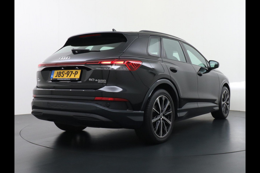 Audi Q4 e-tron 50 quattro Launch edition Advanced 77 kWh VAN: 42.900,- VOOR: 38.877,- UW HERFSTVOORDEEL: 4.023,-  ADAPTIEVE CRUISE CONTROL | LEDEREN BEKLEDING | STOELVERWARMING | ELEKTRISCHE ACHTERKLEP | CAMERA | RIJKLAAR MET 12 MAANDEN BOVAG GARANTIE