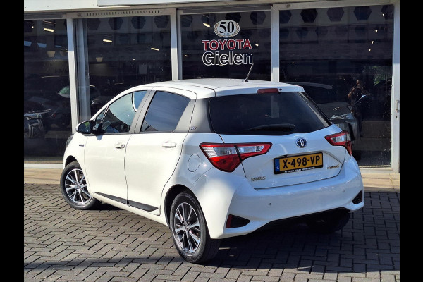 Toyota Yaris 1.5 Hybrid Y20 | Stoelverwarming, Privacy Glass, Keyless, Lichtmetalen velgen, Parkeercamera, Cruise control