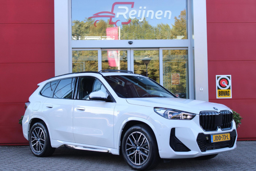 BMW X1 xDrive30e M-SPORT | PANORAMISCH SCHUIF/KANTEL DAK | ELEKTRISCH WEGKLAPBARE TREKHAAK | HARMAN/KARDON AUDIO SYSTEM | ALARMINSTALLATIE | ELEKTRISCH BEDIENBARE VOORSTOELEN MET GEHEUGENFUNCTIE "ACTIEVE ZITPLAATSEN" | STOEL VERWARMING | DRIVING ASSISTANT PROFESSIONAL MET O.A. ACTIVE LANE ASSIST | HARMAN HARDON AUDIO SYSTEM | SHADOW LINE | INNOVATION PAKKET MET O.A. 3D VIEW CAMERA'S, ADAPTIEVE LED KOPLAMPEN, HEAD UP DISPLAY, BMW LIVE PROFFESIONAL DASHBOARD, DRAADLOZE TELEFOONLADER | NAVIGATIE | DRAADLOZE APPLE CARPLAY/ANDROID AUTO | DAB+ RADIO | ELEKTRISCH BEDIENBARE ACHTERKL
