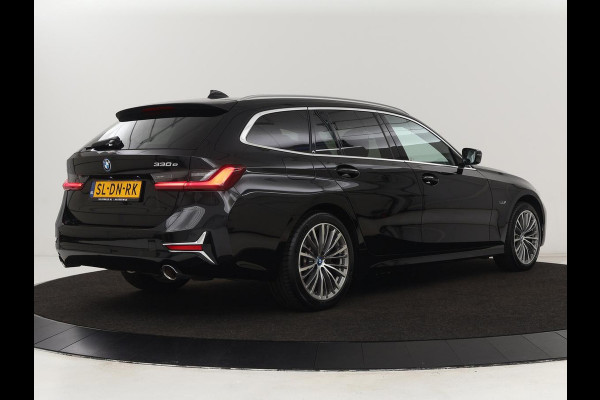 BMW 3-serie 330e xDrive Luxury Line | Panoramadak | Adaptive cruise | Stoelverwarming | Leder | Sportstoelen | Trekhaak | Sfeerverlichting | Live Cockpit | Carplay | Memory | PHEV | Plug In