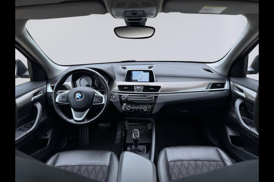 BMW X1 SDrive20i 192 pk High Executive, panoramadak, trekhaak, 1/2 lederen sportinterieur