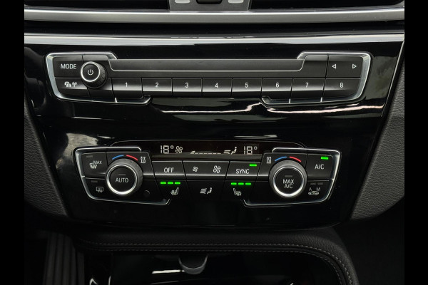 BMW X1 SDrive20i 192 pk High Executive, panoramadak, trekhaak, 1/2 lederen sportinterieur