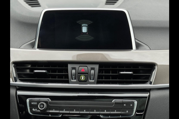 BMW X1 SDrive20i 192 pk High Executive, panoramadak, trekhaak, 1/2 lederen sportinterieur