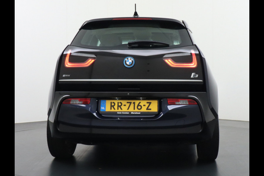 BMW i3 S iPerformance 94Ah 33kWh Schuifkanteldak Navi Ecc Cruise Control Camera Pdc DAB Stoelverwarming Warmtepomp Lmv 20" Led Comfort pack advance Origineel Nederlandse Auto