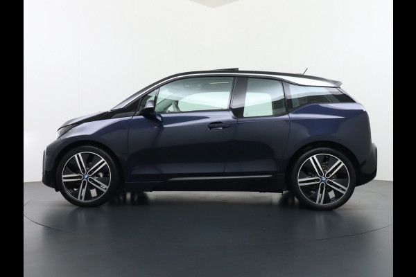 BMW i3 S iPerformance 94Ah 33kWh Schuifkanteldak Navi Ecc Cruise Control Camera Pdc DAB Stoelverwarming Warmtepomp Lmv 20" Led Comfort pack advance Origineel Nederlandse Auto