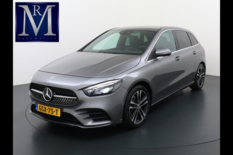Mercedes-Benz B-Klasse 200 Business Solution AMG VAN: 27.900,- VOOR 25.877,- UW HERFSTVOORDEEL: 2.023,- Leder | Elektrische Kofferbak | Ambilight Sfeerverlichting | Rijklaar geleverd met 12 maanden BOVAG-garantie