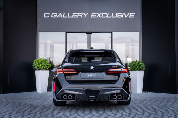 BMW M5 5-serie Touring - Origineel NL | M Drive Professional | Panorama | Carbonpakket | Keramisch | B&W