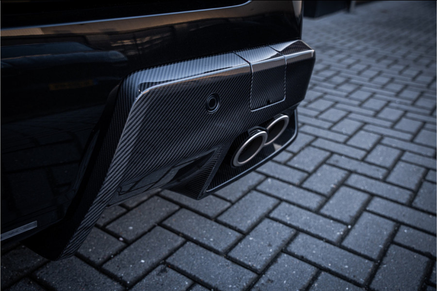 BMW M5 5-serie Touring - Origineel NL | M Drive Professional | Panorama | Carbonpakket | Keramisch | B&W