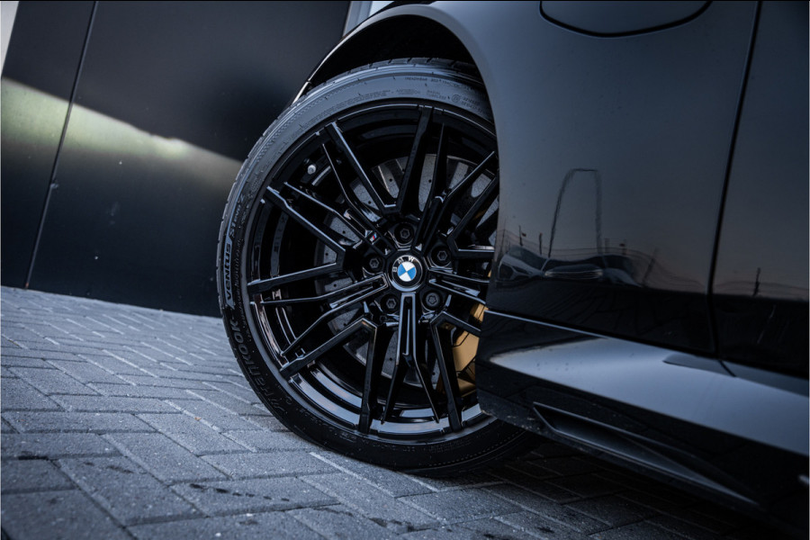 BMW M5 5-serie Touring - Origineel NL | M Drive Professional | Panorama | Carbonpakket | Keramisch | B&W