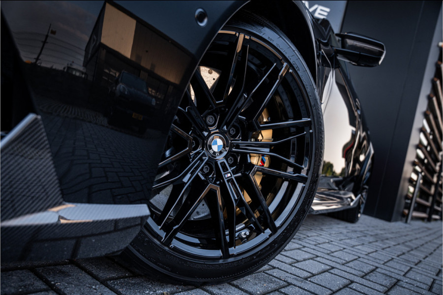 BMW M5 5-serie Touring - Origineel NL | M Drive Professional | Panorama | Carbonpakket | Keramisch | B&W