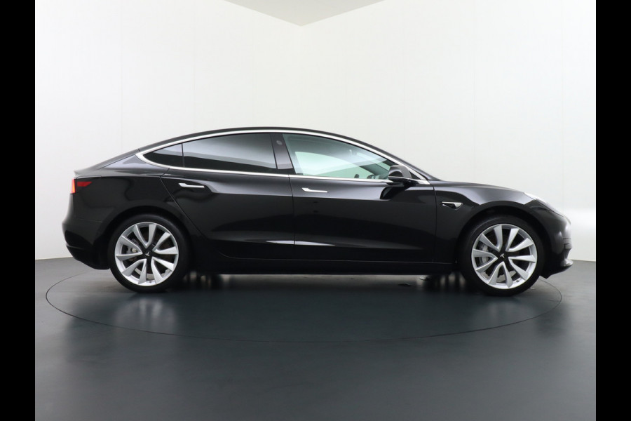 Tesla Model 3 RWD SR+ 60kWh 325PK Lmv 19" AutoPilot Leder PanoDak Adaptive-Cruise Lmv Camera's Elektr.-Stuur+Stoelen+Spiegels+Geheugen+Easy-En Navi LED Comfortstoelen ACC DAB Voorverwarmen interieur via App Keyless via Telefoonsleutel One-Pedal-Drive Origineel Nederlandse auto tot 11kw laden thuis! 1.584kg licht!