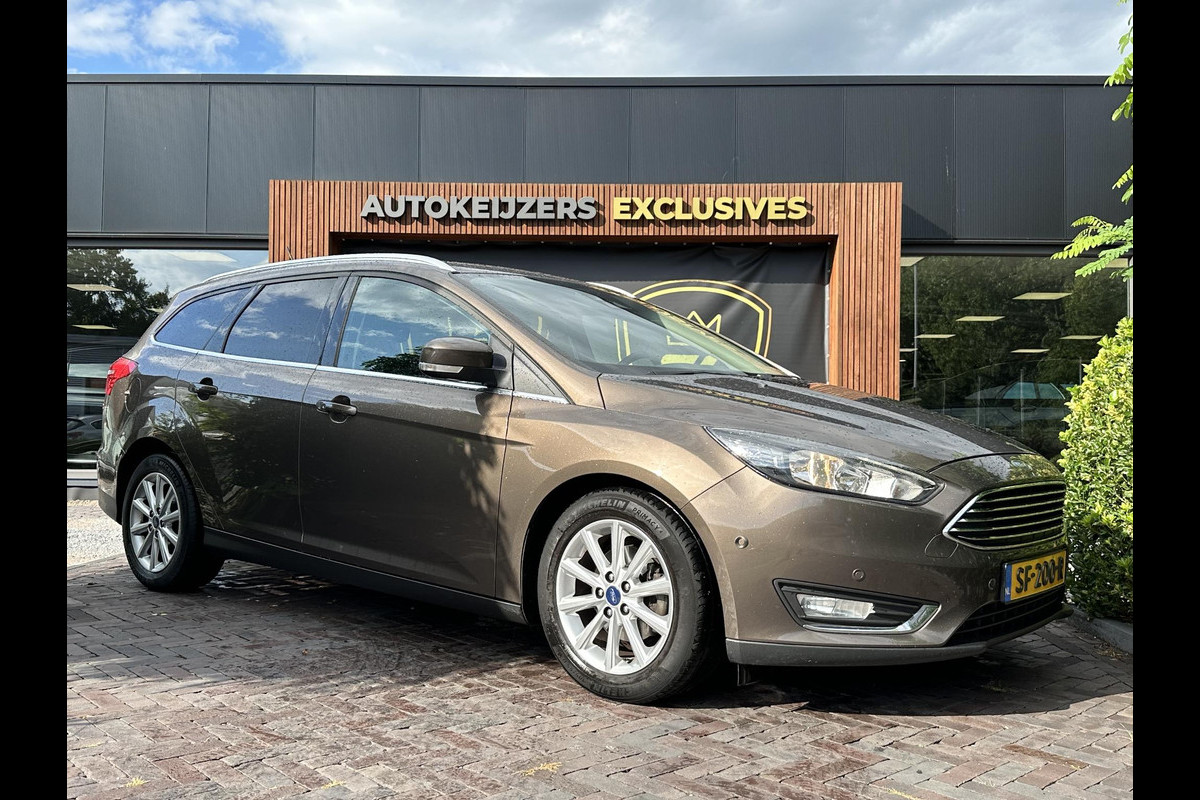Ford FOCUS Wagon 1.0 Titanium Keyless Cruise Control Stoelverw. Navi PDC 16''LM Ford FOCUS Wagon 1.0 Titanium Keyless Cruise Control Stoelverw. Navi PDC 16''LM