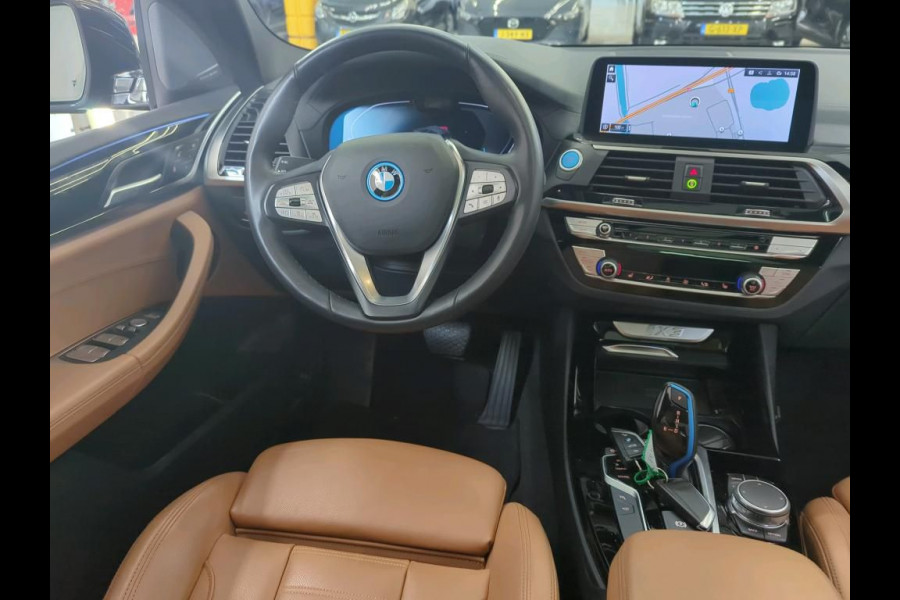 BMW iX3 High Executive 80 kWh | Panoramadak | Keyless | Stoelverwarming | Harman Kardon | Memory Seat | Head-Up Display | 360 Camera | Adaptief Onderstel | Trekhaak | Adaptive LED | Elektrische Stoelen | Apple Carplay | N