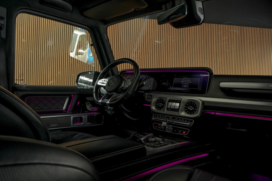 Mercedes-Benz G63 AMG Panodak Carbon Burmester Leer 360 PTS Open dak Navi Memory Stoelventilatie Stoelverwarming Climate NL auto
