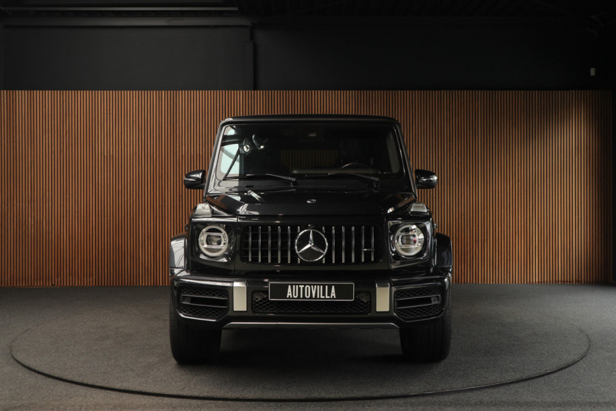 Mercedes-Benz G63 AMG Panodak Carbon Burmester Leer 360 PTS Open dak Navi Memory Stoelventilatie Stoelverwarming Climate NL auto