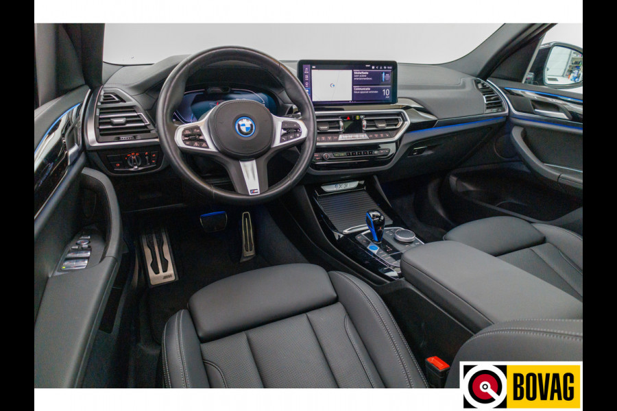 BMW iX3 M-Sport Shadowline 80 kWh 286 PK | Pano | Leer | Elect. stoelen best. met geh. | Camera | Parkeerassistent pakket Licht- en regensensor, PDC, Sportstoelen, Stoelverwarming, Led, Camera, Privacy glas